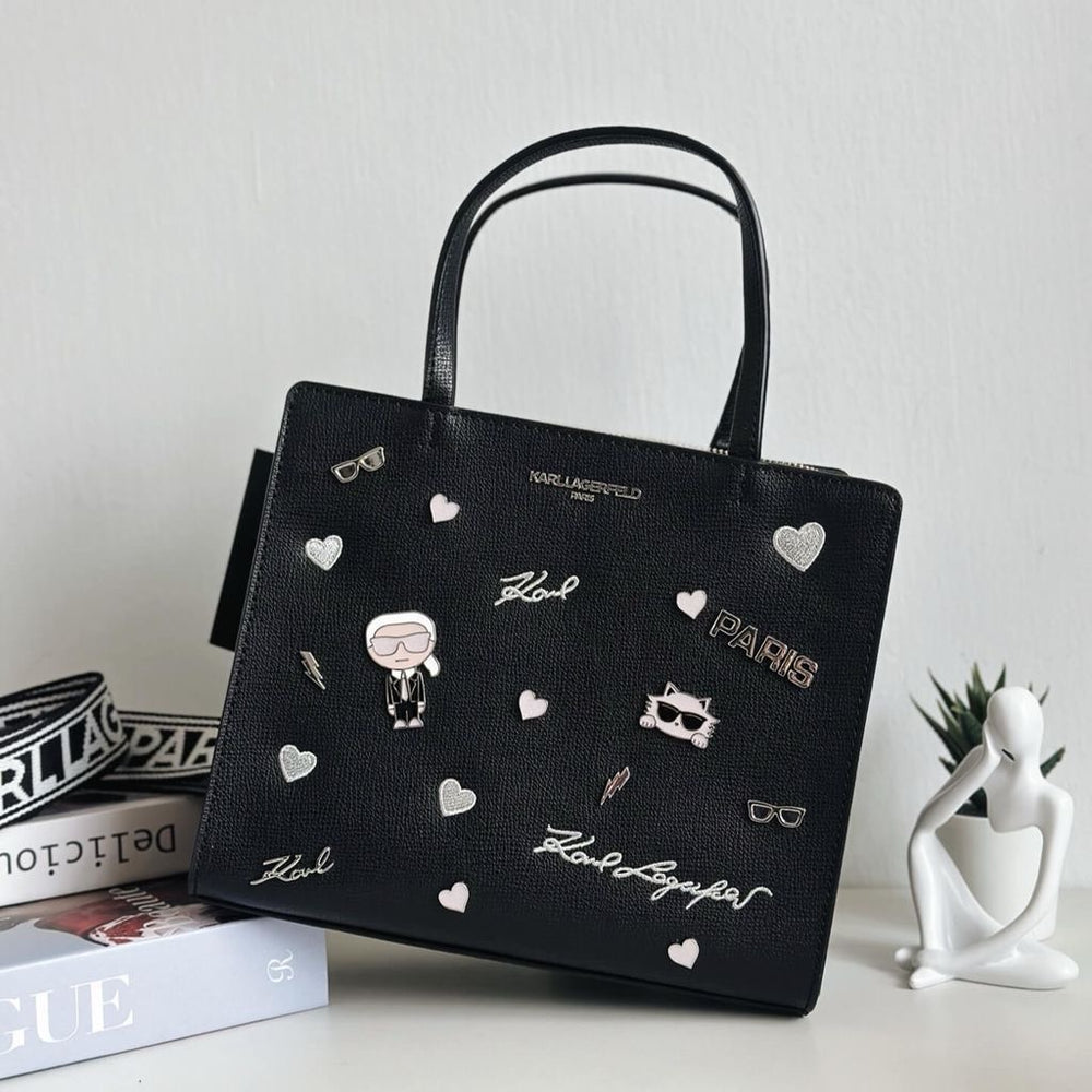 Karl Lagerfeld Paris Maybelle satchel with pins in a faux leather
