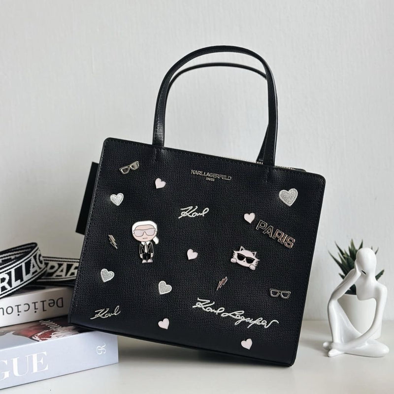 Karl Lagerfeld Paris Maybelle satchel with pins in a faux leather