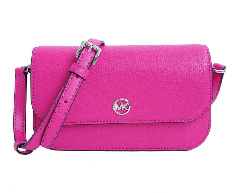 Jet Set Travel small pebbled leather crossbody bag in a fuchsia color.