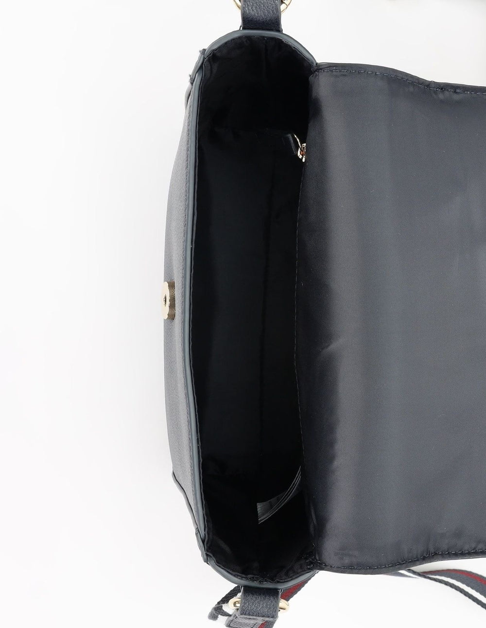 Tommy Hilfiger crossbody bag in faux leather with a signature logo on the front