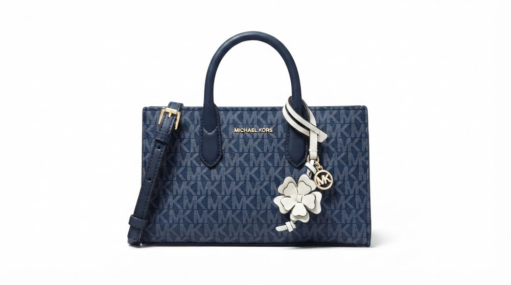 Michael Michael Kors The Scarlett Crossbody Bag is very small with the brand logo