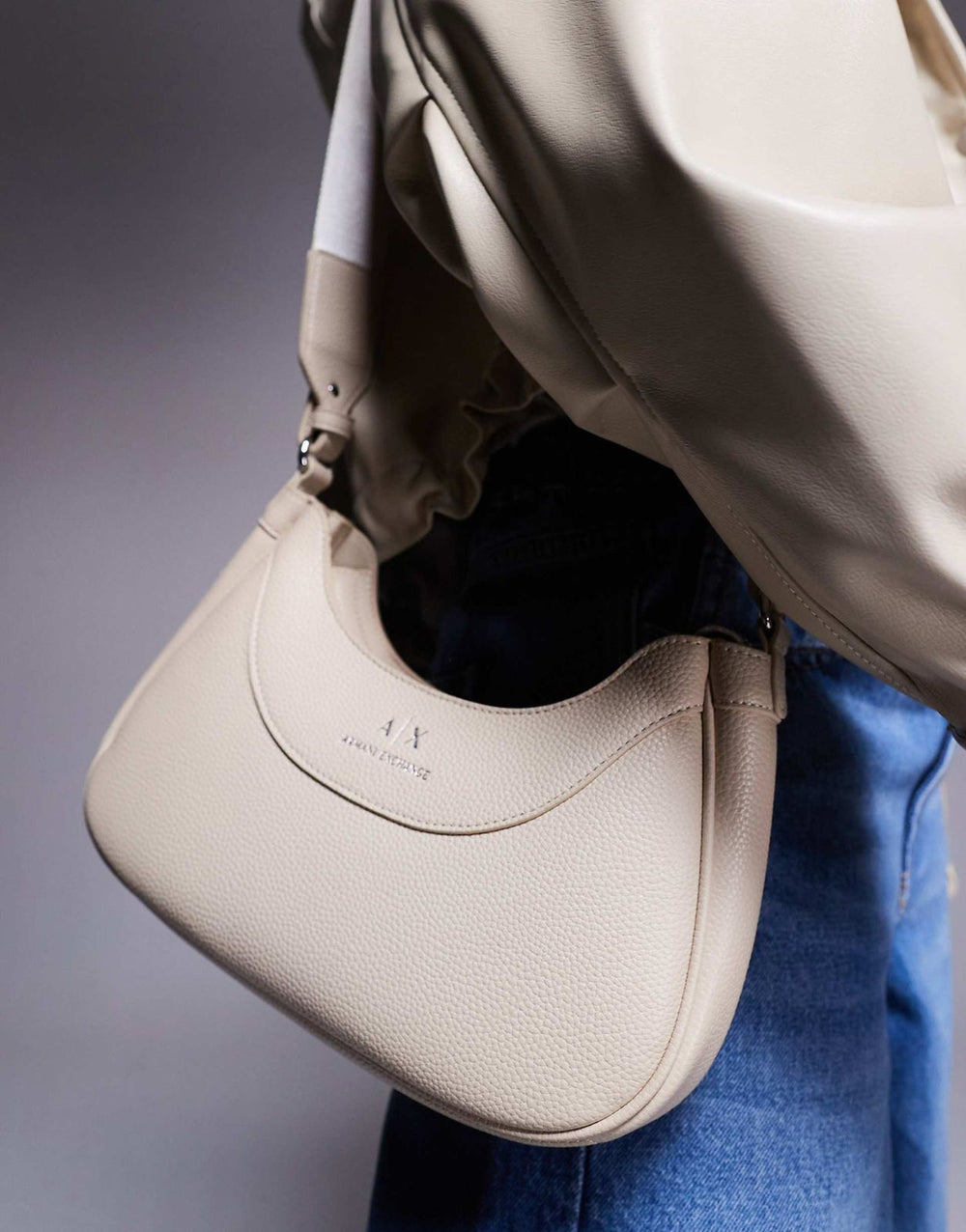 Armani Exchange curved logo shoulder bag in cream
