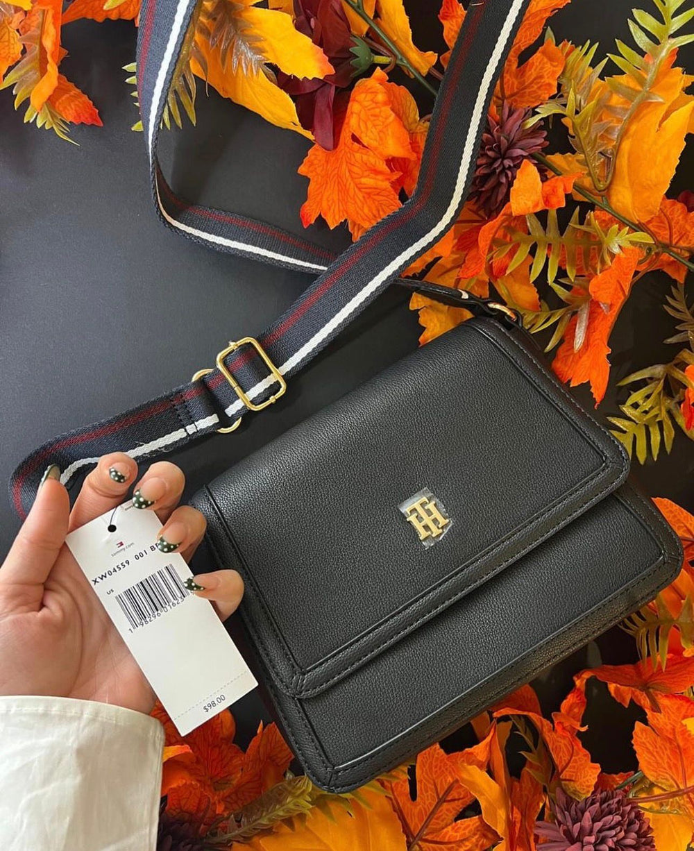 Tommy Hilfiger crossbody bag in faux leather with a signature logo on the front
