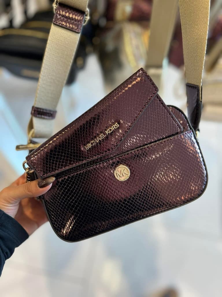 Michael Kors Maisie 2-in-1 camera crossbody bag in a metallic purple