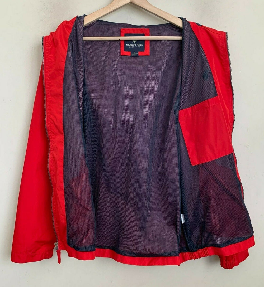 Windbreaker with a hood is female U.S. Polo Assn