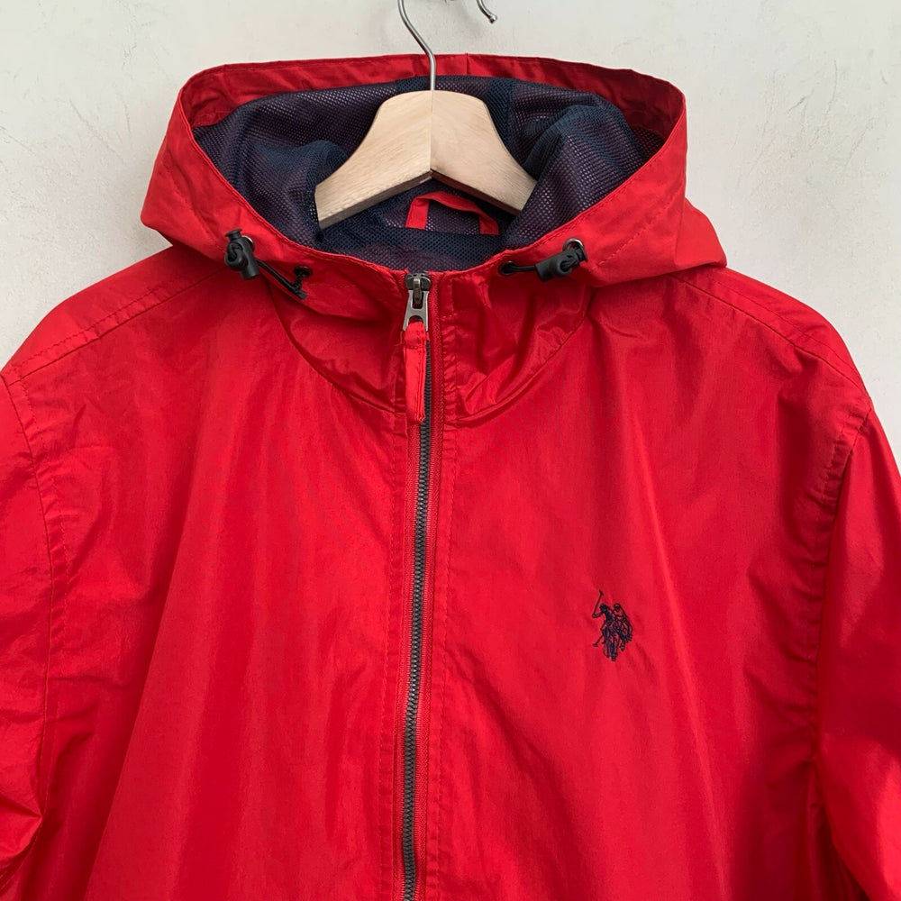 Windbreaker with a hood is female U.S. Polo Assn
